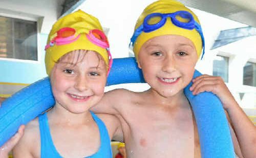 St Mary’s pupils Anisja Kuziw and Tyson Spies have fun out of the pool. St Mary’s pupils Anisja Kuziw and Tyson Spies have fun out of the pool.